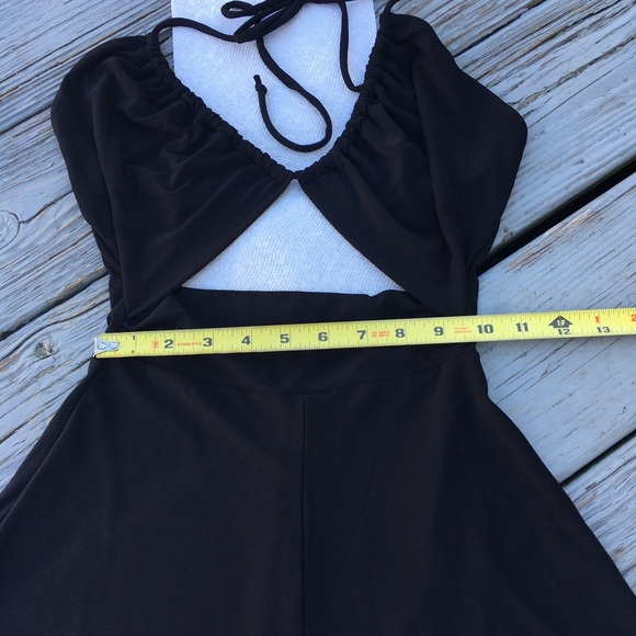 back less black romper with ties neck and open under chest. - Picture 8 of 8